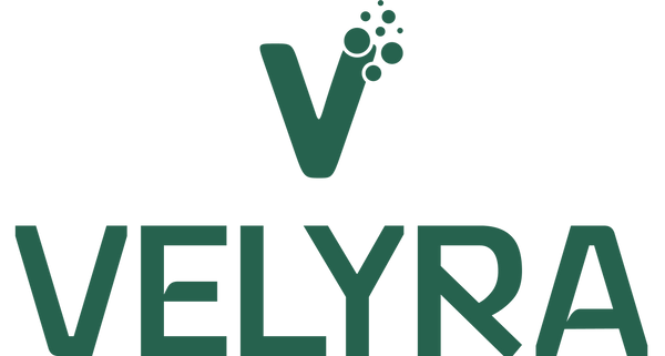 The Velyra brand logo in dark green, featuring a stylized 'V' with floating dots above the word 'VELYRA' on a plain white background.